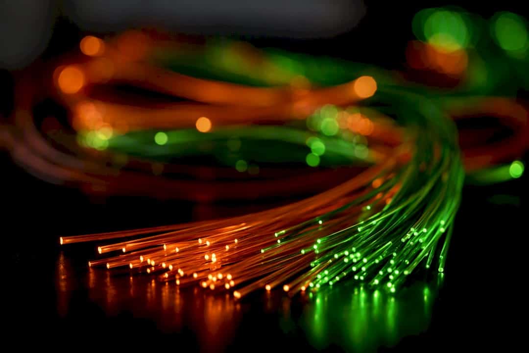 Glowing fiber optic cables symbolizing diverse AI data sources