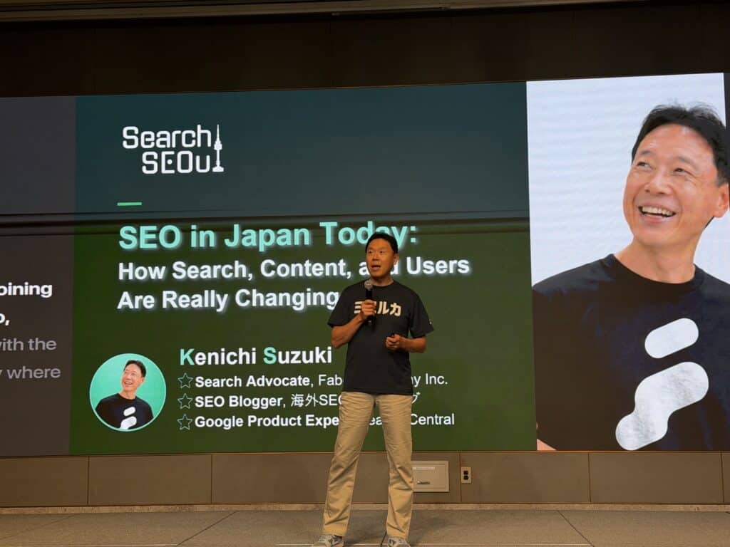 top japanese seo speaker kenichi suzuki presenting at search seoul in korea (photo by connor kimball)